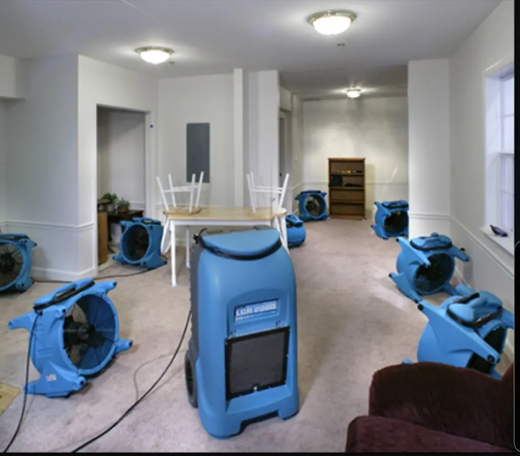 Air movers and dehumidifier setup for Water Extraction & Removal in Goddard